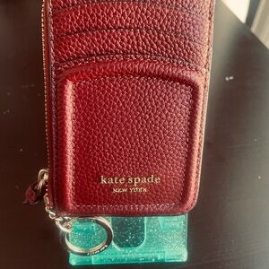 Kate Spade Burgundy Leather 6 Card holder with zipper pocket